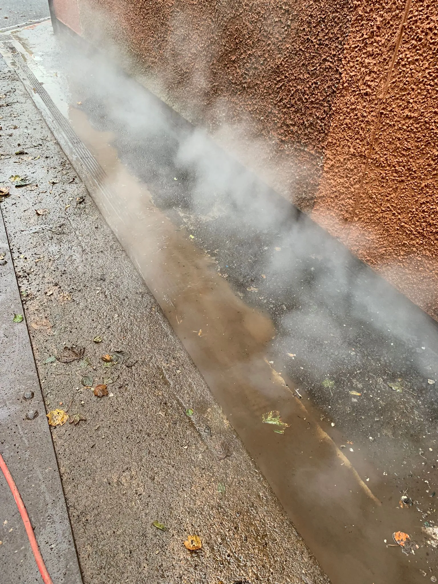 Work being carried out on a chimney at roof level
