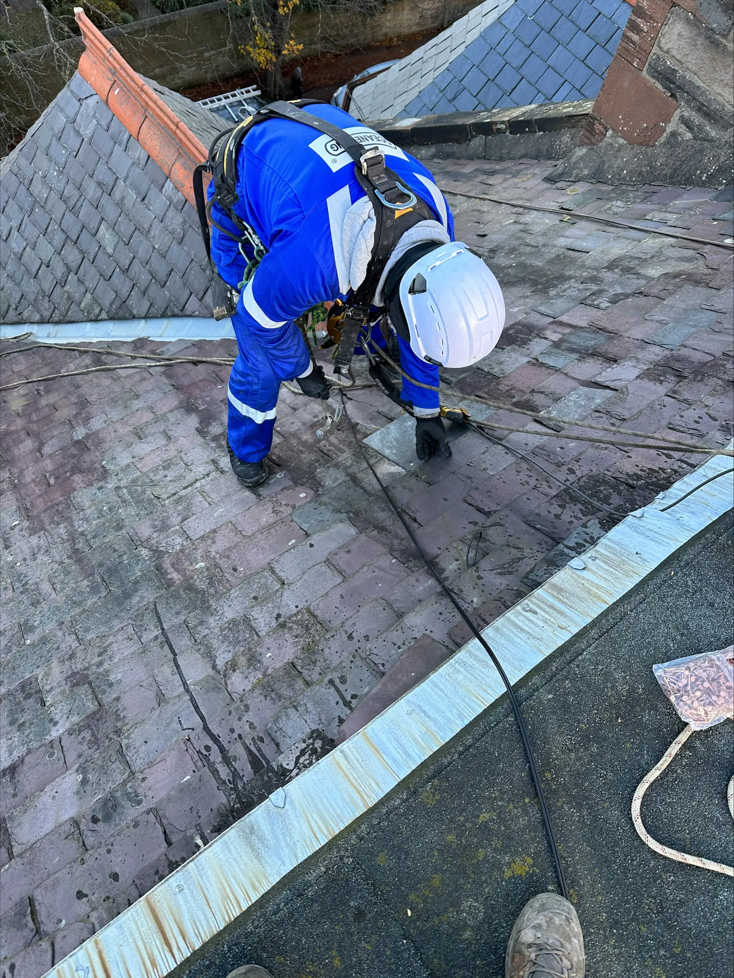 Rope access slate repairs on an Edinburgh roof