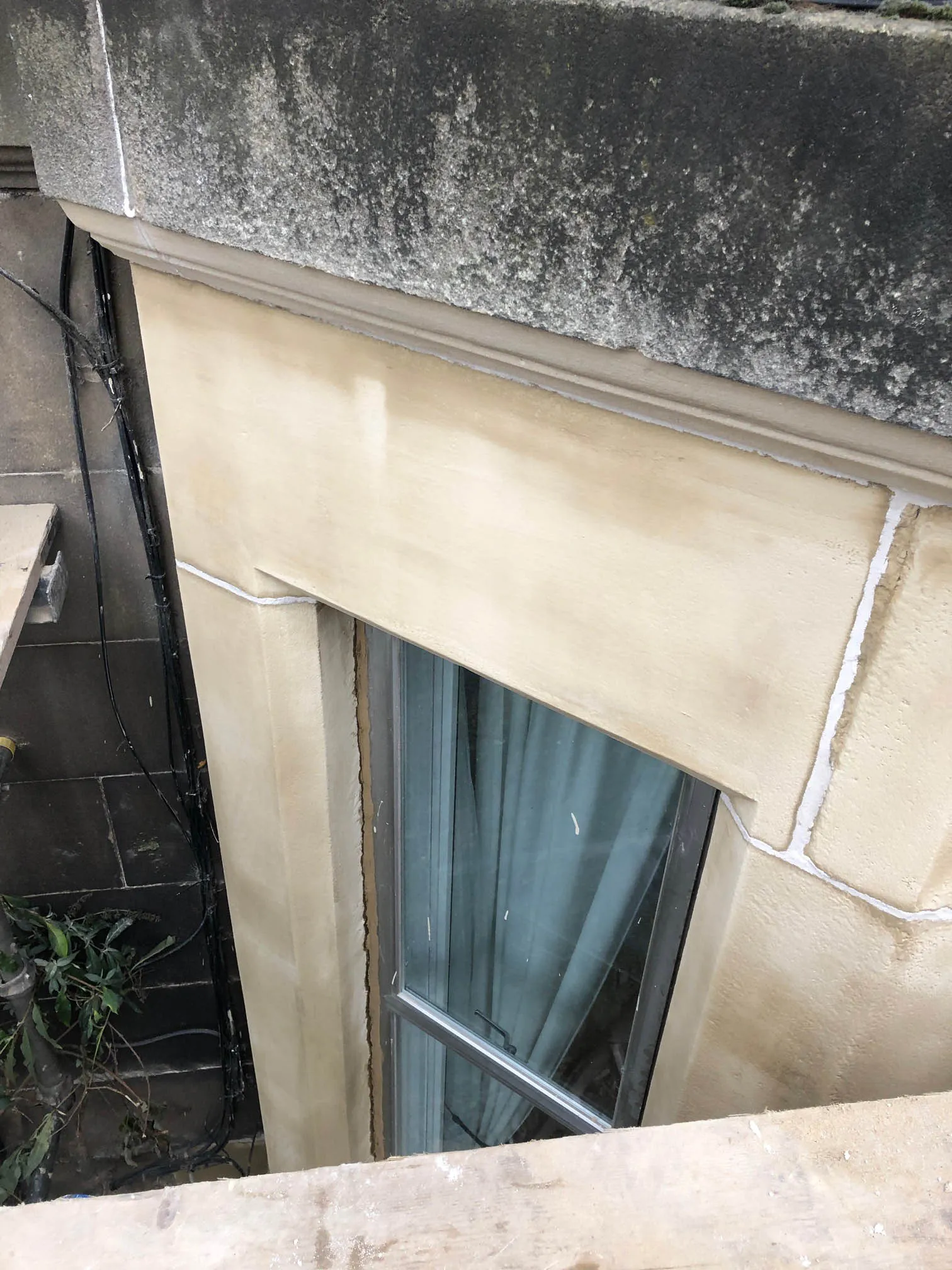 Sand mastic repair to a window in Edinburgh