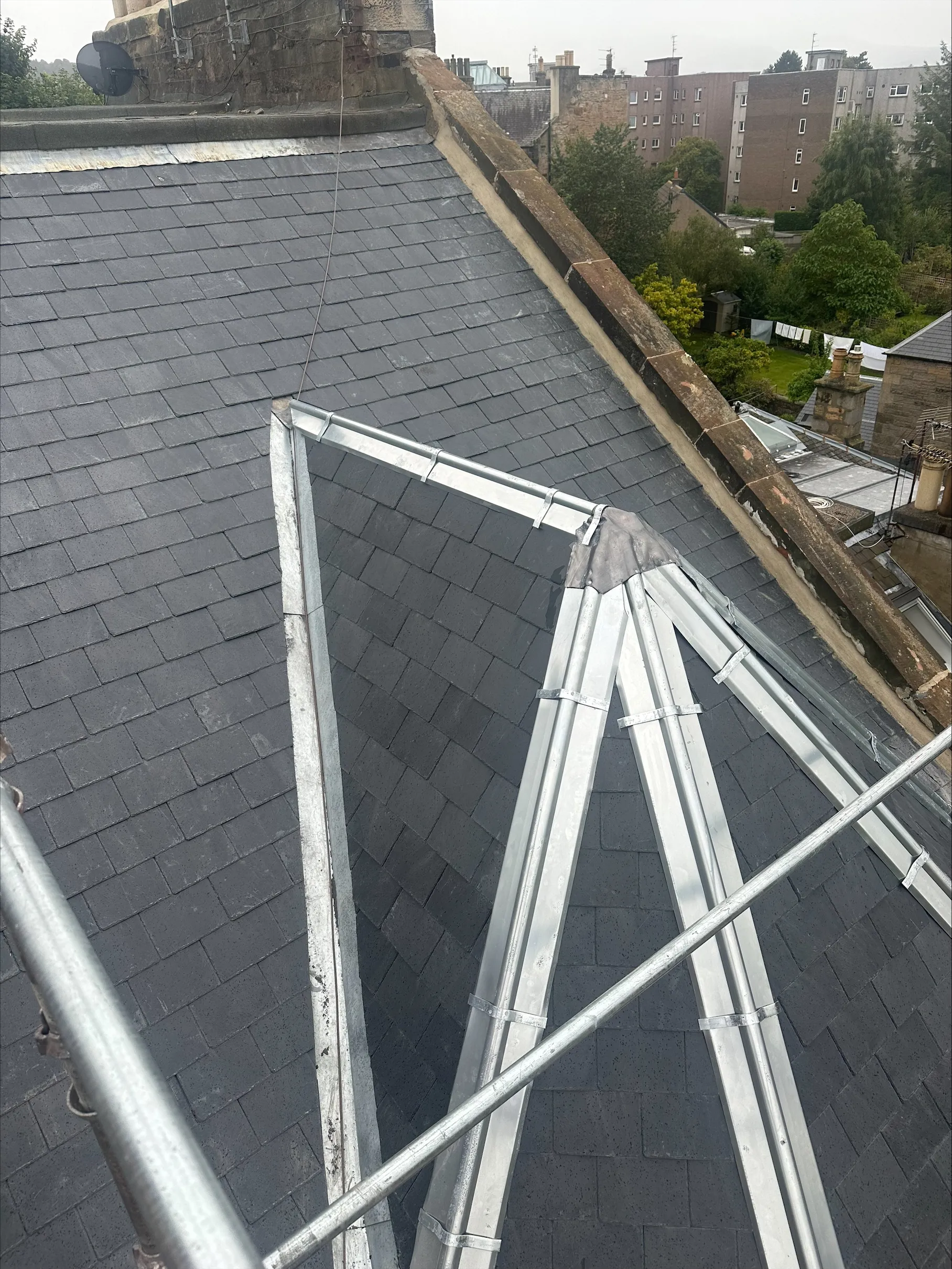 Slate roof and rooflight seen from above