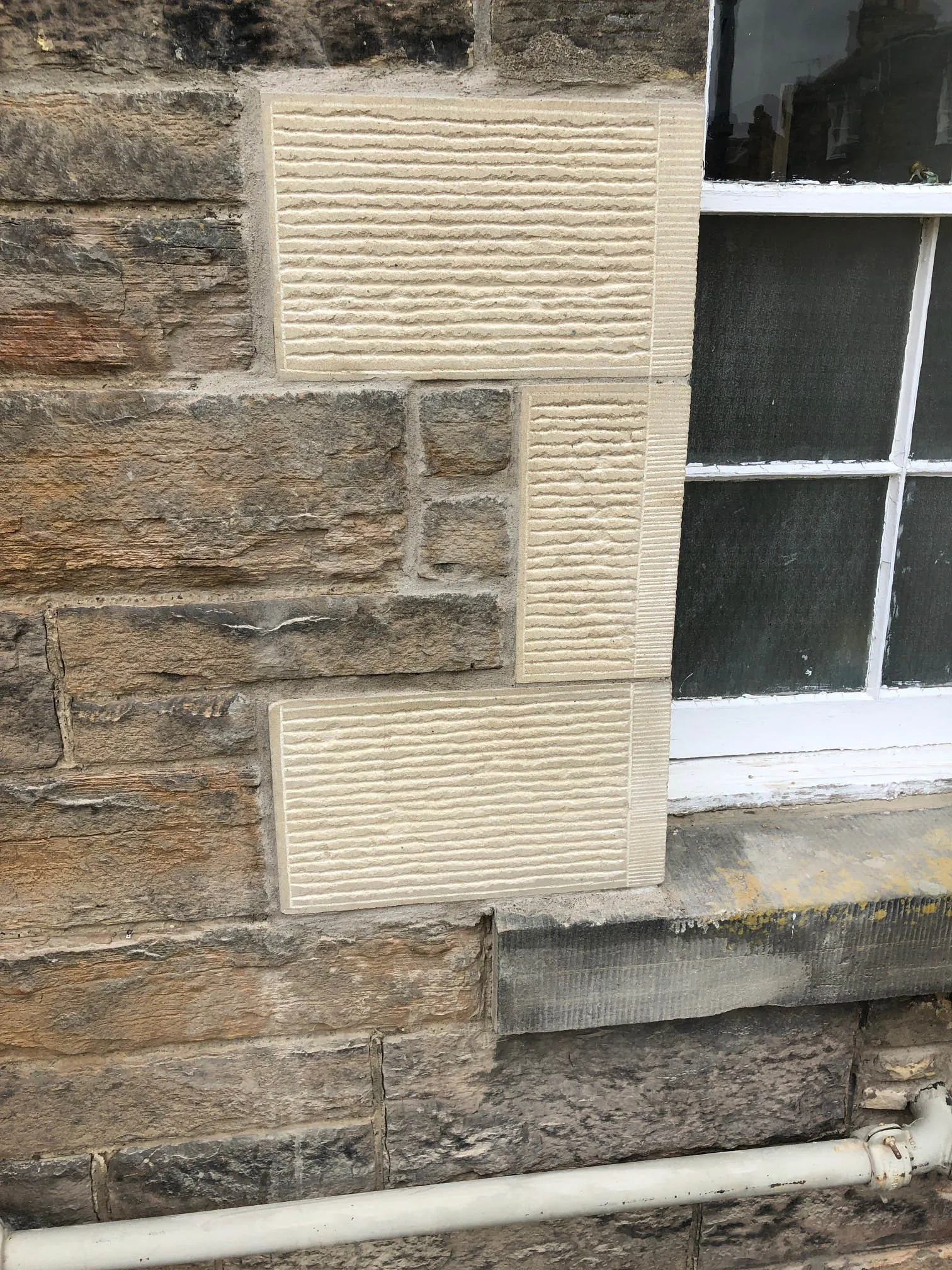 Replacement sandstone indented into an Edinburgh elevation